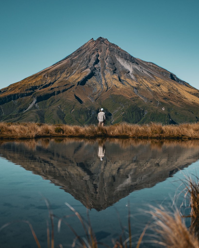 Photographer's portrait Mount Taranaki from the tarns in Egmont National Park, New Zealand